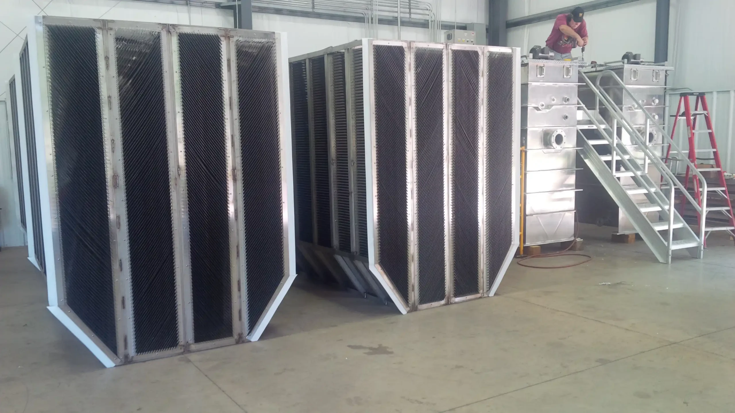 Mercer separator plate assemblies and service access